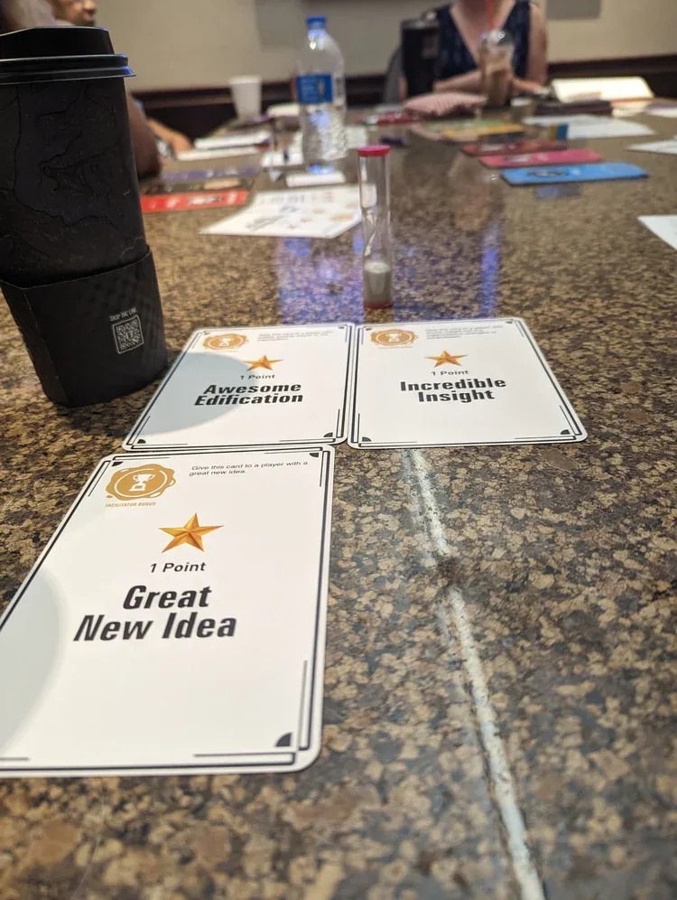Facilitator bonus cards awarded during a Reject Mediocrity leadership session
